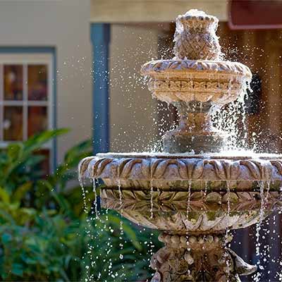Water fountain in backyard - 3 advantages of installing a solar-powered water pump in your garden